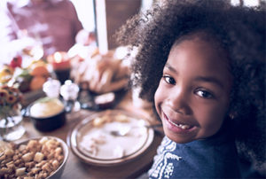 little girl eating thanksgiving celebration concept